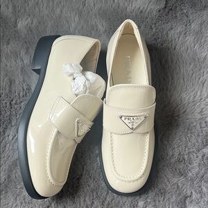 Prada Ivory Patent Leather Loafers